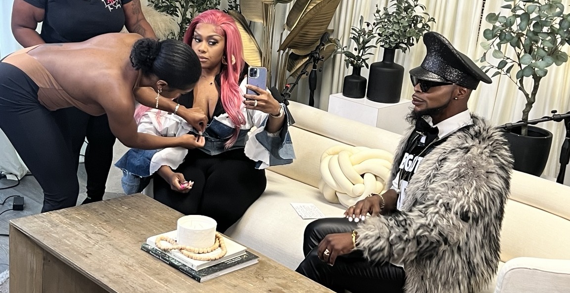 The team preparing an interview on the WhatWow set